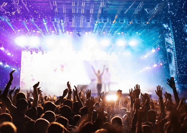 crowd-partying-stage-lights-live-600nw-2182949725